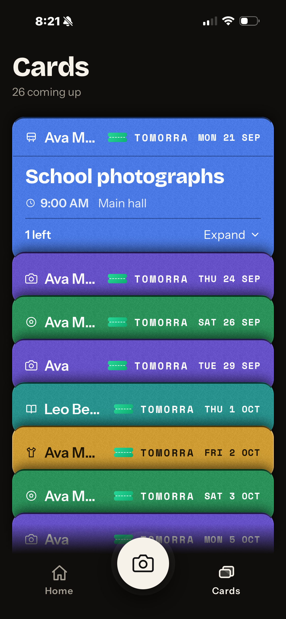 Tomorra Cards screen showing a mixed stack of blue, purple, green, teal and gold plans for two children.